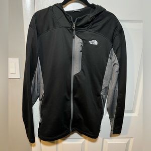 The north Face full zip light weight jacket with hood.